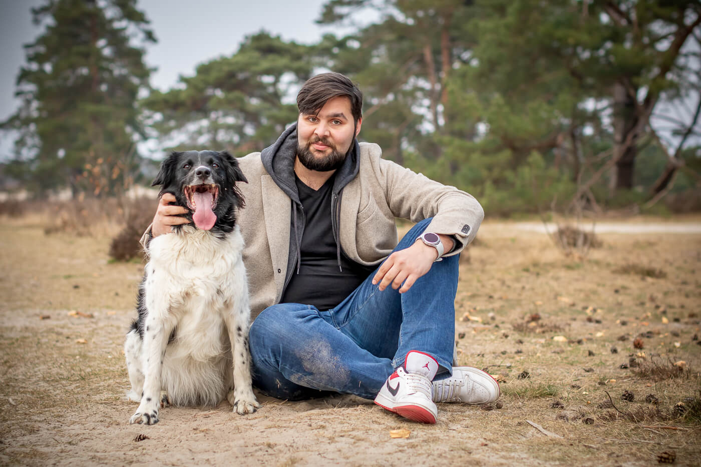 Portret Friese Stabij hond en baasje in Soesterduinen